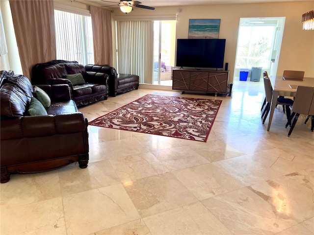 1180 Gulf Blvd Unit 306, Clearwater, FL 33767 - living room with plenty of natural light and ceiling fan