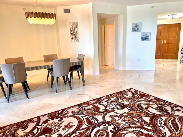 1180 Gulf Blvd Unit 306, Clearwater, FL 33767 - dining space featuring marble finish floors and baseboards