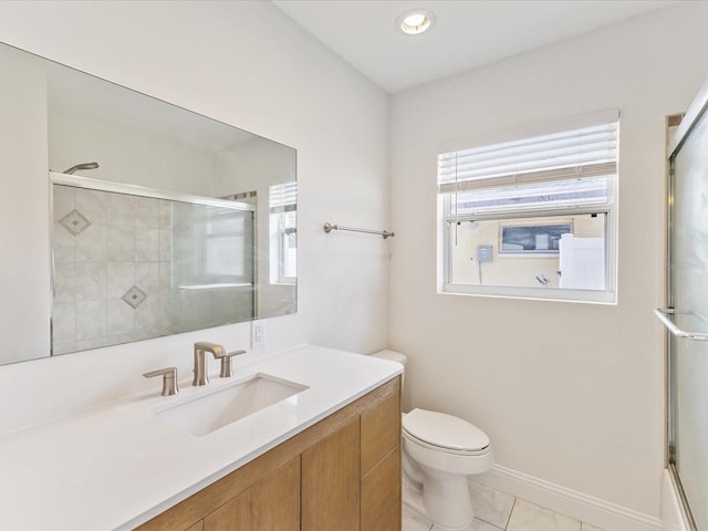 2016 Cove Dr, Largo, FL 33774 - bathroom with a shower with door, vanity, plenty of natural light, toilet, and recessed lighting