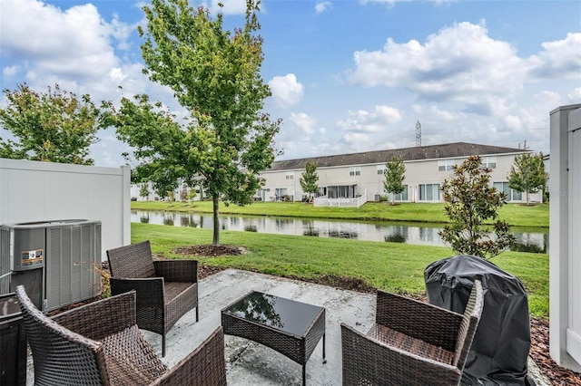 7030 Summer Holly Pl, Riverview, FL 33578 - view of patio / terrace with a water view and grilling area