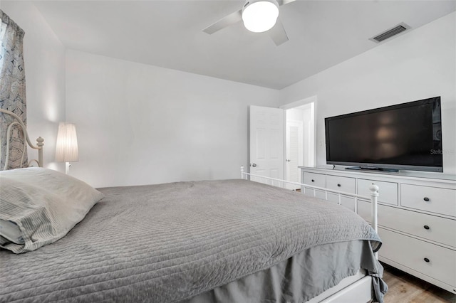 1117 Tyrone Blvd N, Saint Petersburg, FL 33710 - bedroom with wood finished floors and a ceiling fan