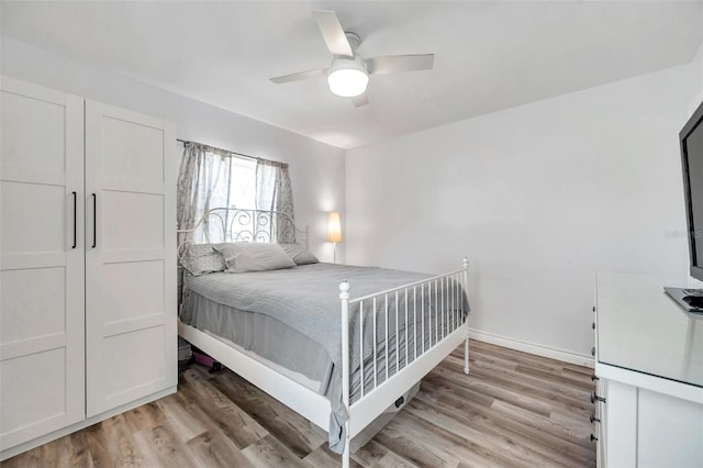 1117 Tyrone Blvd N, Saint Petersburg, FL 33710 - bedroom with light wood-style floors, baseboards, and ceiling fan