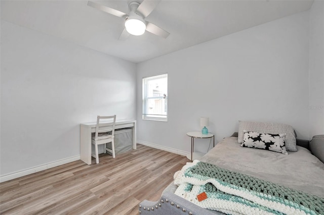 1117 Tyrone Blvd N, Saint Petersburg, FL 33710 - bedroom featuring wood finished floors, baseboards, and a ceiling fan