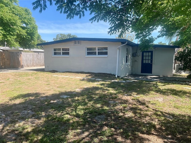 10367 109th Ave, Largo, FL 33773 - rear view of house with concrete block siding