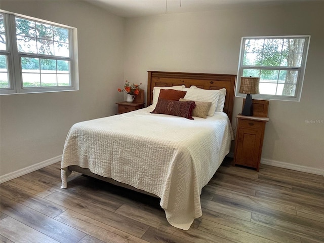 2748 Crk 543, Sumterville, FL 33585 - bedroom featuring wood finished floors and baseboards