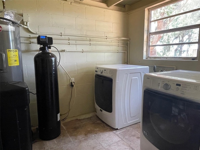2748 Crk 543, Sumterville, FL 33585 - laundry room featuring washer and clothes dryer and concrete block wall