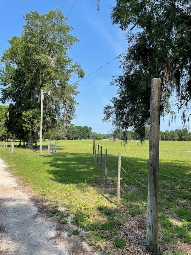 2748 Crk 543, Sumterville, FL 33585 - view of dirt / gravel road featuring a view of rural / pastoral area