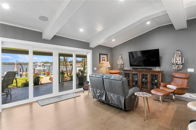 4649 Neptune Dr SE, Saint Petersburg, FL 33705 - living area featuring hardwood / wood-style floors, a water view, and recessed lighting