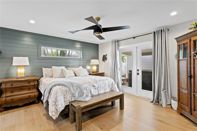4649 Neptune Dr SE, Saint Petersburg, FL 33705 - bedroom with french doors, access to outside, multiple windows, light wood-style floors, and recessed lighting