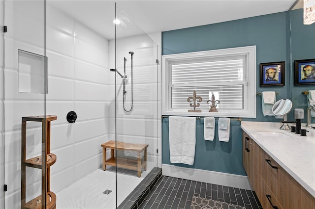 4649 Neptune Dr SE, Saint Petersburg, FL 33705 - full bath with a stall shower, vanity, tile patterned floors, and baseboards