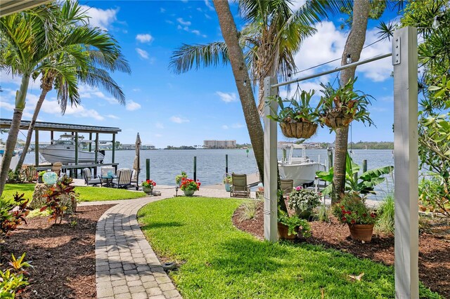 4649 Neptune Dr SE, Saint Petersburg, FL 33705 - water view featuring boat lift and a boat dock
