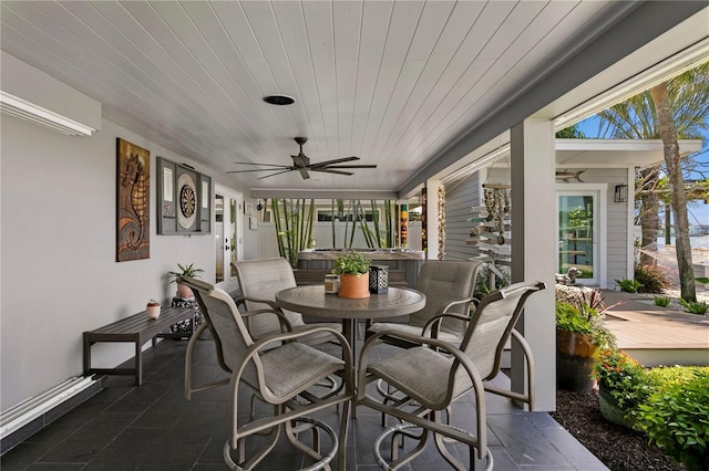 4649 Neptune Dr SE, Saint Petersburg, FL 33705 - sunroom / solarium featuring a hot tub