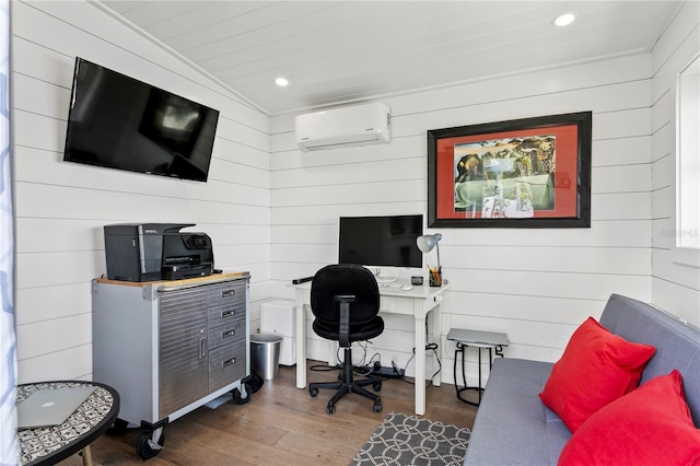 4649 Neptune Dr SE, Saint Petersburg, FL 33705 - home office with a wall unit AC, wooden walls, wood finished floors, and recessed lighting