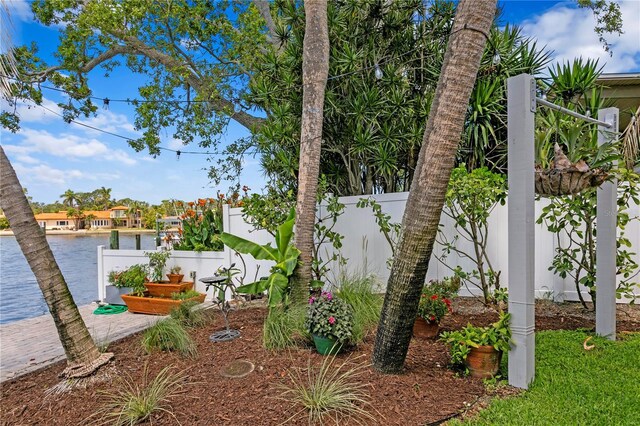 4649 Neptune Dr SE, Saint Petersburg, FL 33705 - fenced backyard with a water view