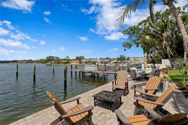 4649 Neptune Dr SE, Saint Petersburg, FL 33705 - dock featuring an outdoor fire pit, a water view, and a patio