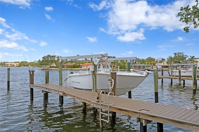 4649 Neptune Dr SE, Saint Petersburg, FL 33705 - dock area with boat lift and a water view