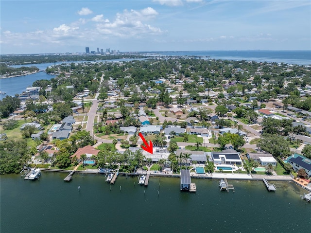 4649 Neptune Dr SE, Saint Petersburg, FL 33705 - aerial perspective of suburban area with a large body of water