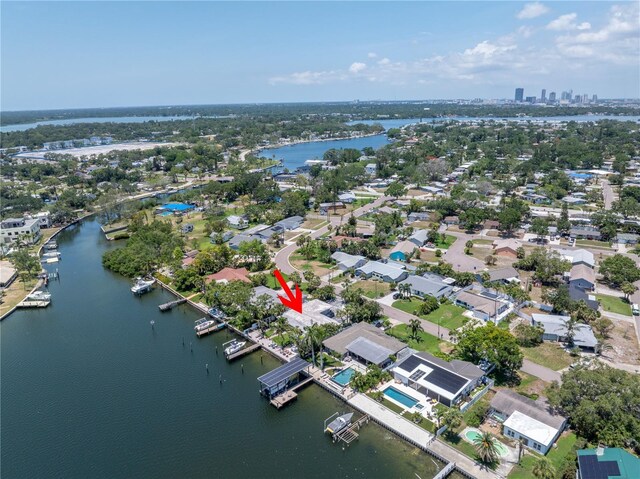 4649 Neptune Dr SE, Saint Petersburg, FL 33705 - aerial view of property and surrounding area featuring a nearby body of water