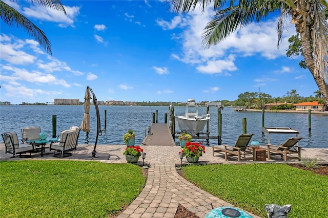4649 Neptune Dr SE, Saint Petersburg, FL 33705 - dock area featuring a yard, a water view, and boat lift