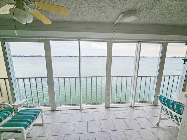 6060 Shore Dr S Unit 906, Gulfport, FL 33707 - sunroom with a water view