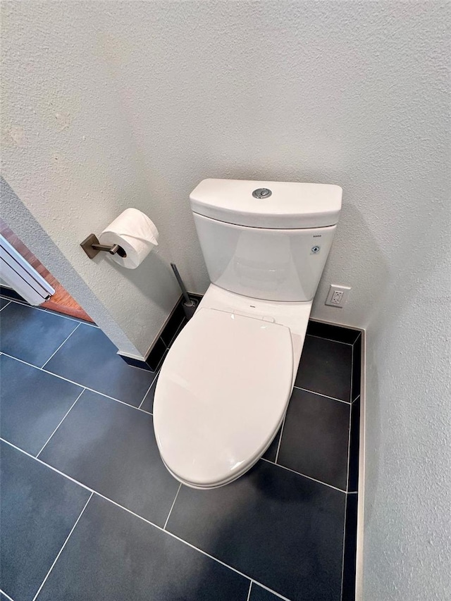 608 Black Lion Dr NE, Saint Petersburg, FL 33716 - bathroom with toilet and tile patterned flooring