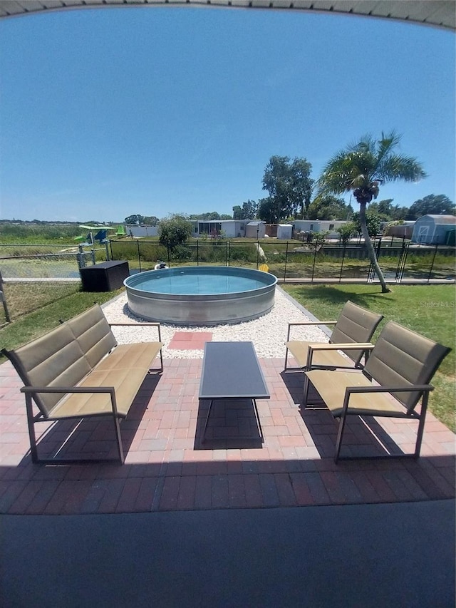 10142 118th Ave, Largo, FL 33773 - outdoor pool featuring a patio area