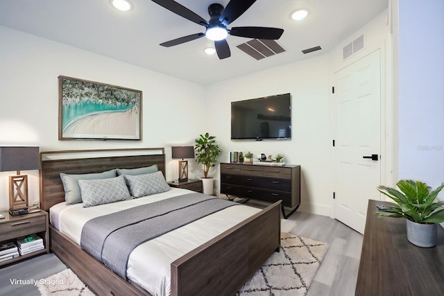 4260 Saint Lawrence Dr, New Port Richey, FL 34655 - bedroom featuring light wood finished floors, recessed lighting, baseboards, and ceiling fan