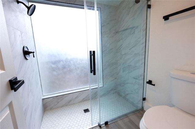 4260 Saint Lawrence Dr, New Port Richey, FL 34655 - bathroom with toilet, a marble finish shower, and wood finished floors