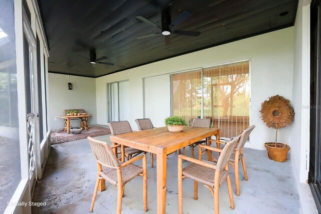 4260 Saint Lawrence Dr, New Port Richey, FL 34655 - sunroom with a ceiling fan and outdoor dining area