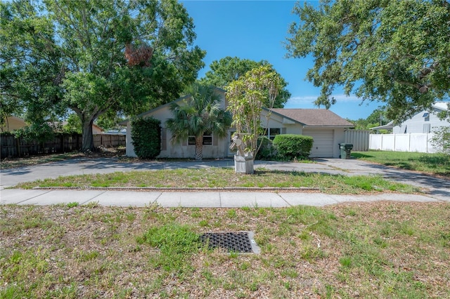 3256 Adrian Ave, Largo, FL 33774 - view of front of property featuring concrete driveway and an attached garage