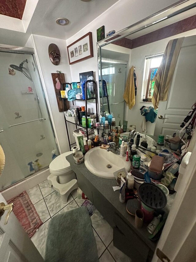 1559 San Roy Dr, Dunedin, FL 34698 - full bathroom with a stall shower, vanity, and toilet