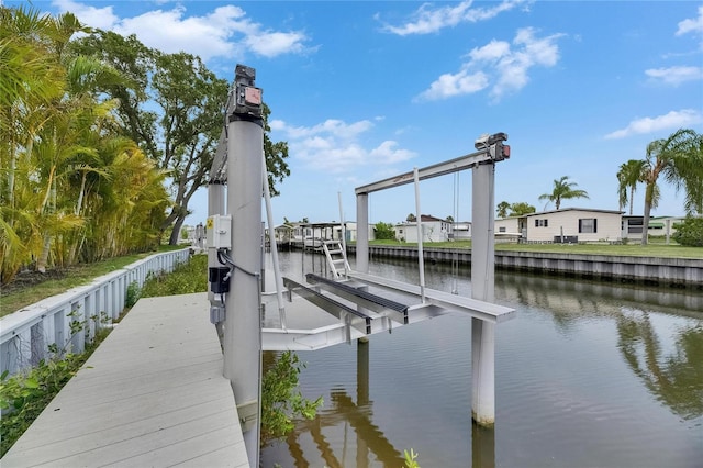 6534 Simone Shores Cir, Apollo Beach, FL 33572 - dock featuring boat lift and a water view