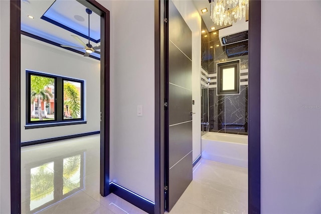 6534 Simone Shores Cir, Apollo Beach, FL 33572 - hall with tile patterned flooring, a chandelier, and recessed lighting