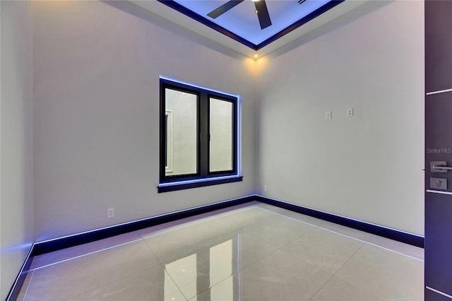 6534 Simone Shores Cir, Apollo Beach, FL 33572 - tiled spare room with a ceiling fan and baseboards