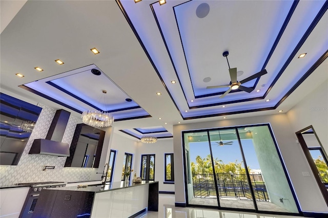 6534 Simone Shores Cir, Apollo Beach, FL 33572 - interior space featuring a ceiling fan, a sink, and a chandelier