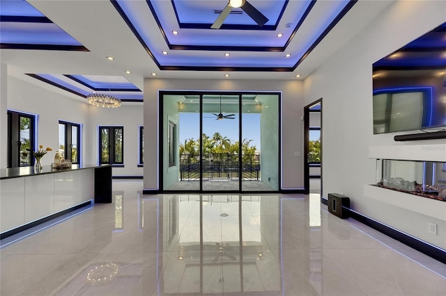 6534 Simone Shores Cir, Apollo Beach, FL 33572 - corridor with a raised ceiling, plenty of natural light, baseboards, tile patterned floors, and recessed lighting
