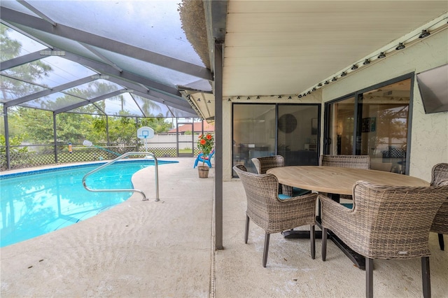 3968 Orchard Hill Cir, Palm Harbor, FL 34684 - outdoor pool with a patio and glass enclosure