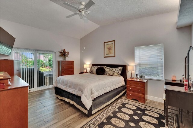 905 Balsamina Dr, Brandon, FL 33510 - bedroom with wood finished floors, access to exterior, lofted ceiling, baseboards, and a ceiling fan