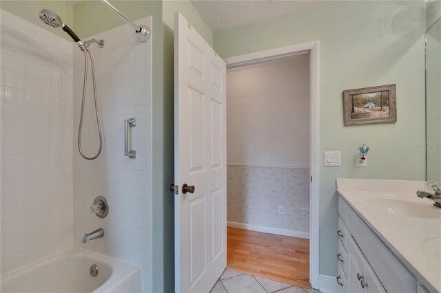 905 Balsamina Dr, Brandon, FL 33510 - full bath featuring vanity, tub / shower combination, baseboards, and wood finished floors