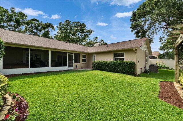 905 Balsamina Dr, Brandon, FL 33510 - back of property with stucco siding and central AC unit
