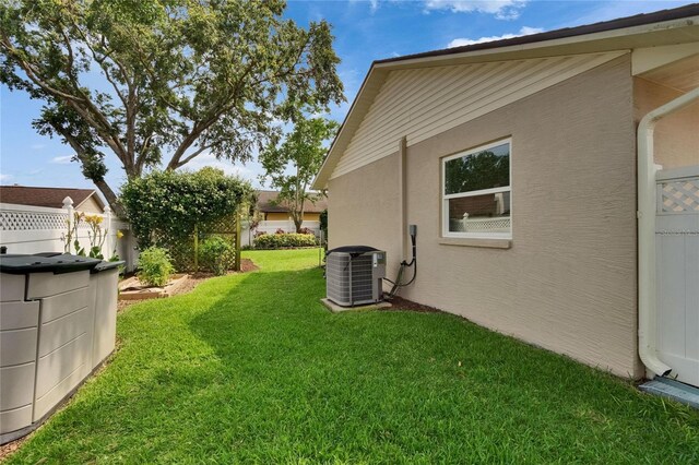 905 Balsamina Dr, Brandon, FL 33510 - view of yard with central air condition unit