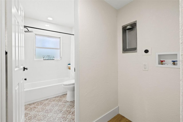 3300 52nd St N, Saint Petersburg, FL 33710 - bathroom with shower / bathtub combination, toilet, a textured wall, and tile patterned floors
