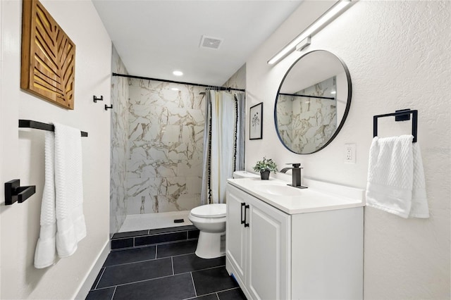 3300 52nd St N, Saint Petersburg, FL 33710 - full bathroom with tile patterned floors, vanity, toilet, and a marble finish shower