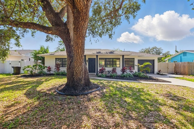 3300 52nd St N, Saint Petersburg, FL 33710 - ranch-style home with driveway, a garage, and a gate