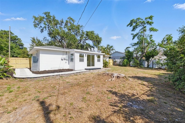 3300 52nd St N, Saint Petersburg, FL 33710 - back of house with a fenced backyard