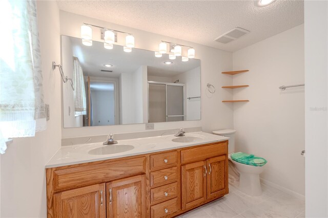 12220 Twin Branch Acres Rd, Tampa, FL 33626 - full bath featuring double vanity, toilet, a textured ceiling, and a shower stall