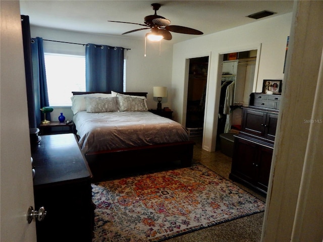 10308 Fore Dr, Tampa, FL 33612 - bedroom featuring ceiling fan and multiple closets