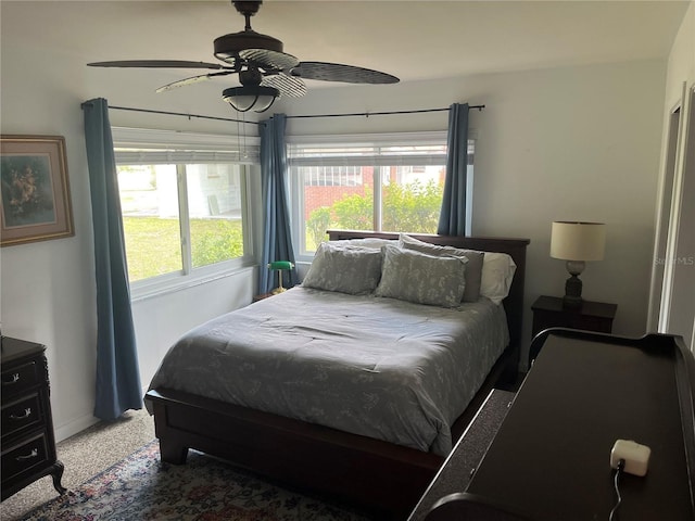 10308 Fore Dr, Tampa, FL 33612 - bedroom with ceiling fan and baseboards