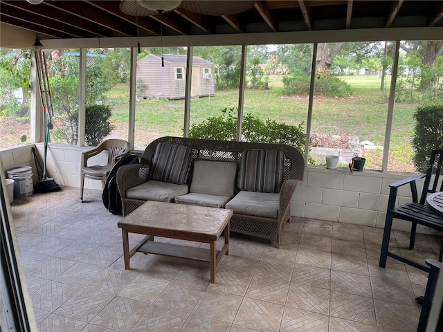10308 Fore Dr, Tampa, FL 33612 - sunroom / solarium featuring outdoor lounge area and ceiling fan