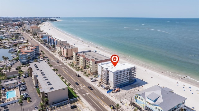 14048 Gulf Blvd Unit 302, Madeira Beach, FL 33708 - drone / aerial view of waterfront with a beach and apartment complex